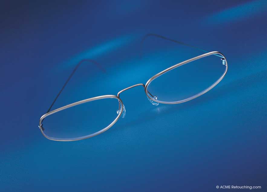 High resolution photo retouched to convert rimless glasses to rimmed
